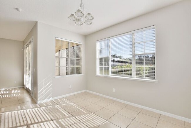 Building Photo - Spacious 4/2.5 Townhome in Gated Community in Avalon Park - Orlando