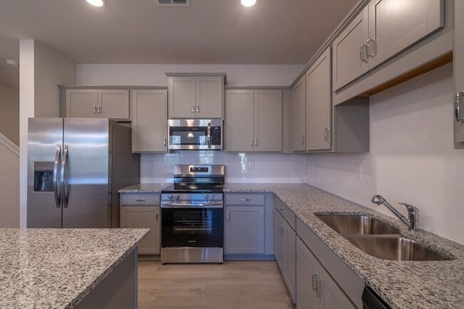 Building Photo - Beautiful Brand New 3 Bedroom 2.5 Bath Townhome in Hickory Glen!