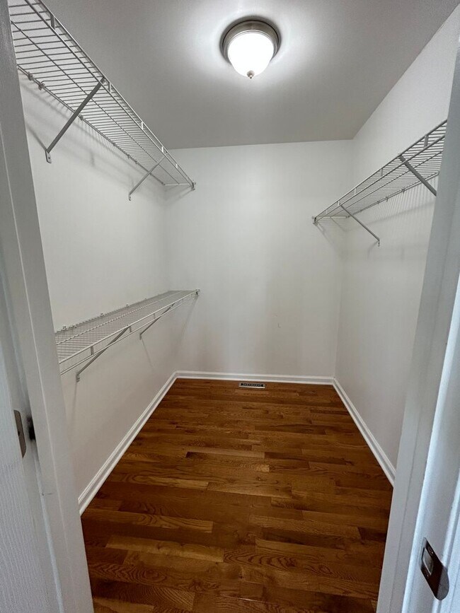 Building Photo - Space, Style - Move-In Ready 4-Bedroom End Unit with Finished Basement & Garage