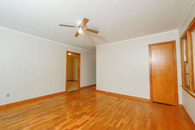 Building Photo - "Charming 3-Bedroom Greenfield Home with Gleaming Hardwood Floors – 1256 Sq Ft of Cozy Comfort!"