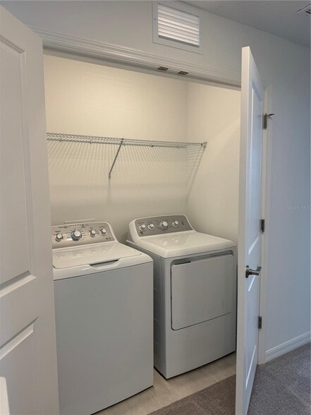 Laundry closet upstairs - 16559 San Nicola Pl