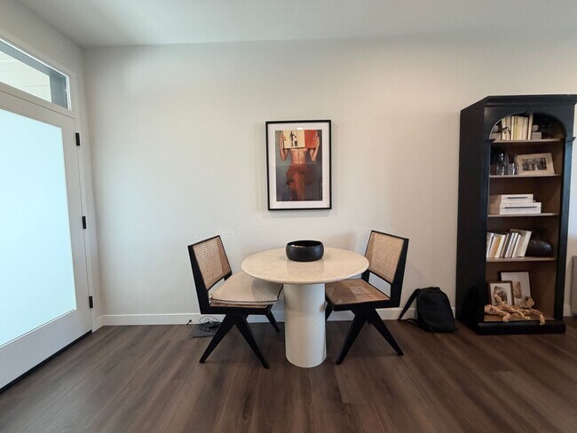 Building Photo - Top-Floor Corner Condo with Downtown Views — Stylish, Pristine, and Steps From Everything