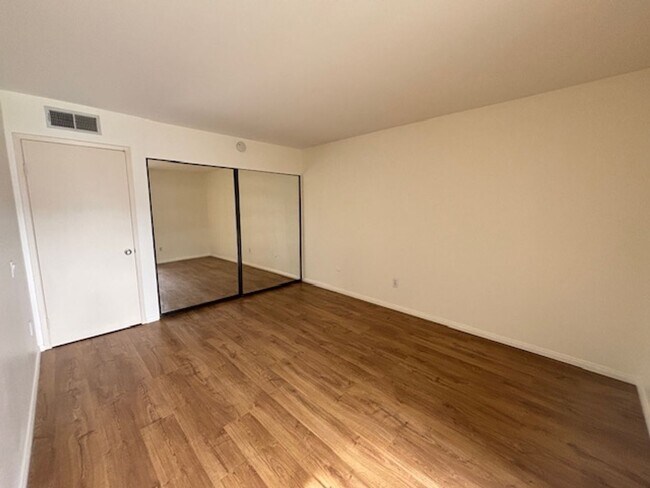 Building Photo - Spacious 1BD/1BA Mission Plaza Condo with Resort-Style Amenities in Prime Mission Valley Location