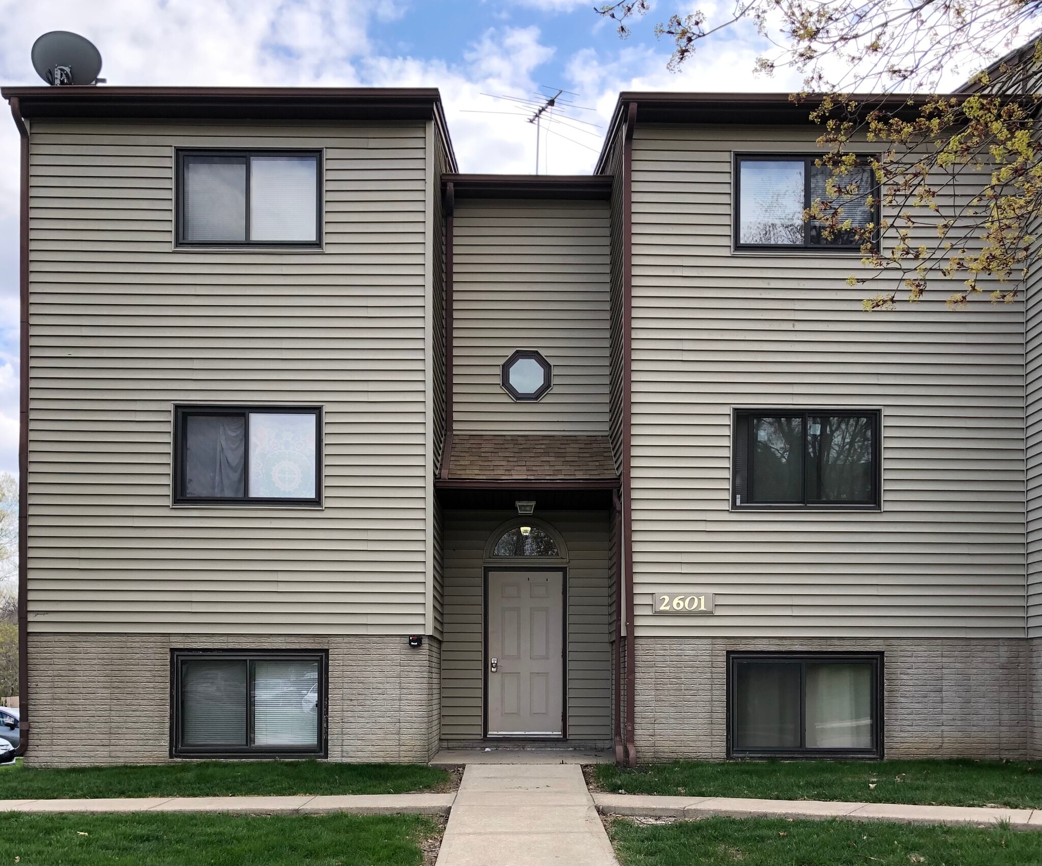 The building at 2601 Westwinds Drive. Unit 2 is the top right window. - 2601 Westwinds Dr