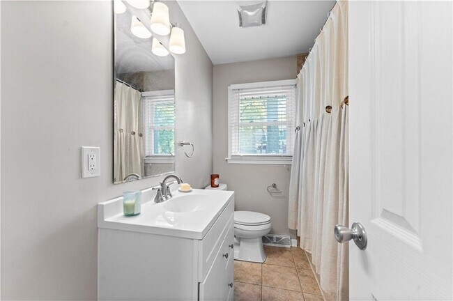 Main level hall Bath - 7635 W 114th Ter