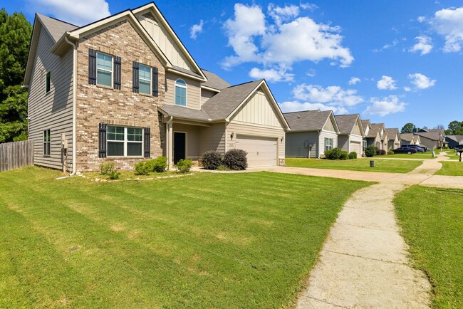 Building Photo - Spacious 5BR Home with Huge Fenced Backyard in The Reserve at Wyndham Gates!