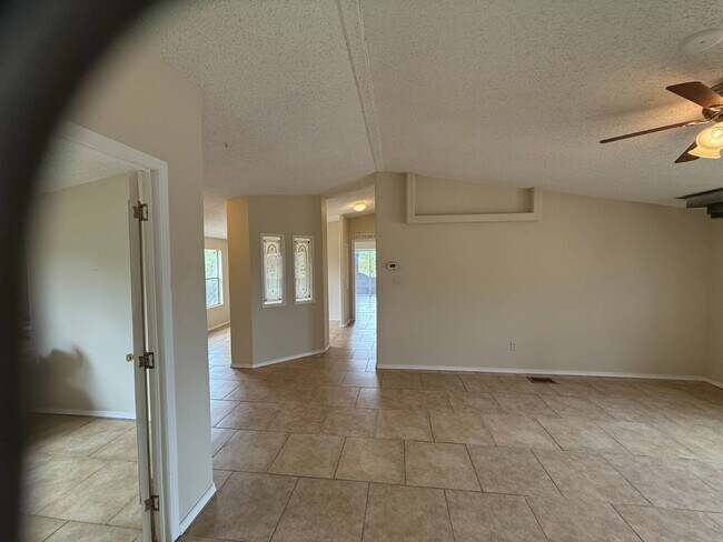 Building Photo - 6575 N Pelto Path