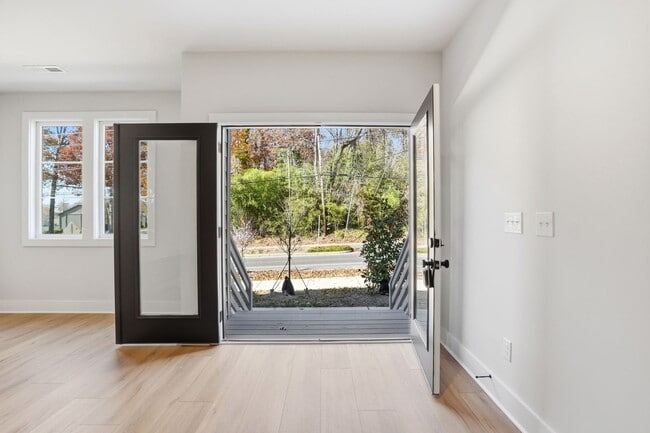Building Photo - Bright, Open & Exceptionally Large—Your Ideal 2-Story Townhome