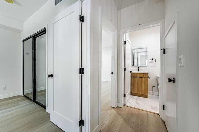 Building Photo - Modern 4-Bedroom Townhome-Style Living in ...