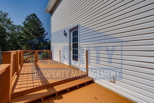 Building Photo - Updated house with carport and shed on corner lot!