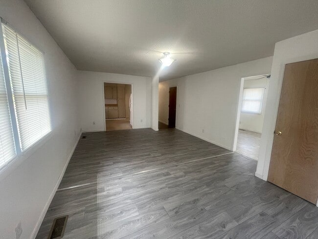 Building Photo - Brick Ranch- Dunn- 4 bedroom 2.5 bath- 2 car carport- Corner Lot