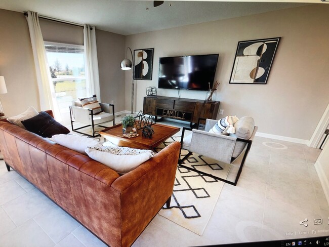 Family/Living room, photo from model house - 656 Tanaro Ln