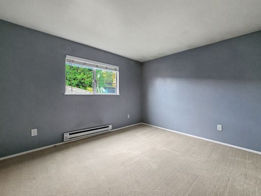 Building Photo - AVAILABLE NOW! Charming West Seattle Home featuring a garage, spacious deck, and wood-burning fir...