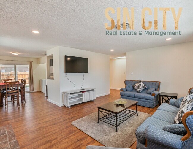 Building Photo - "Charming 4-Bedroom Retreat in Las Vegas –...