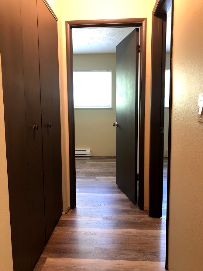 Hallway to bedrooms with large linen closet - 3808 SE Cesar Estrada Chavez Blvd