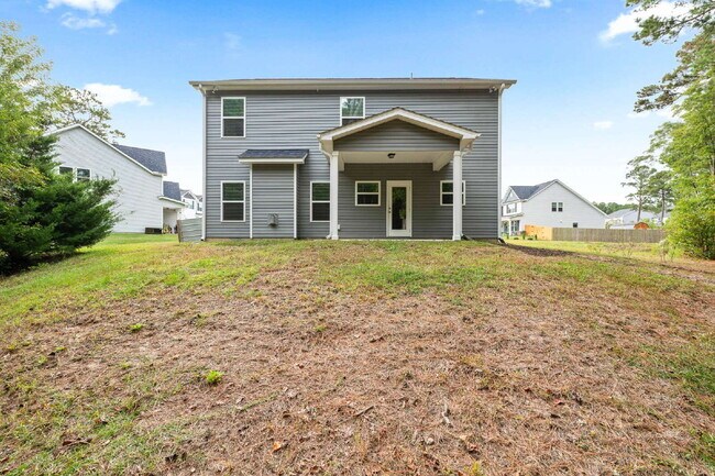 Building Photo - Spacious 4-Bedroom Retreat with 2.5 Baths ...