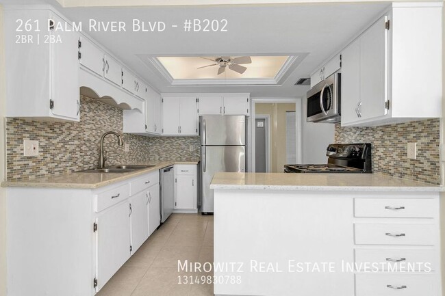 Building Photo - Beautiful 2BR/2BA Naples Condo with 1 Car ...