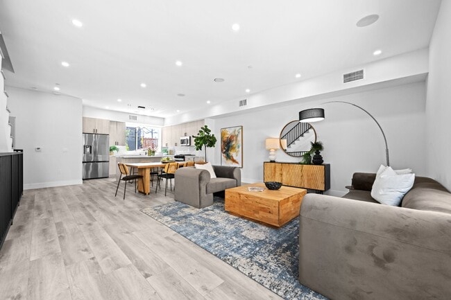 Building Photo - Stunning brand-new 3 Bedroom 4 Bathroom townhouse with private garage and rooftop balcony!