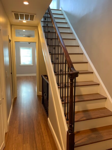 Second floor hallway/staircase to third level. - 2241 12th Plz NW