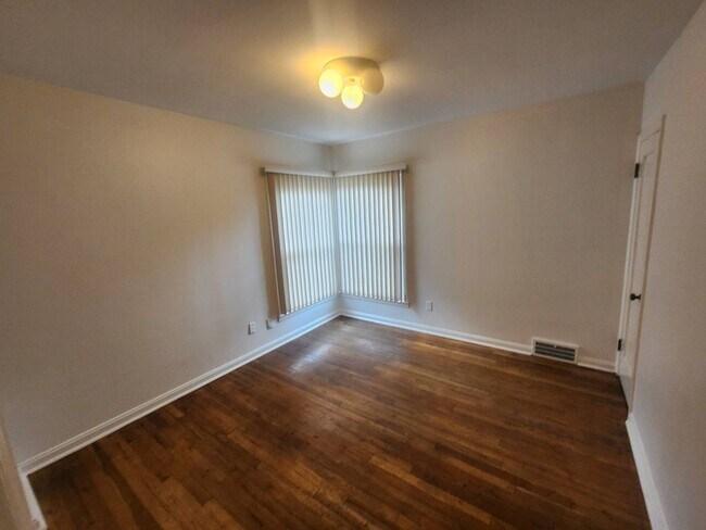 Building Photo - Move-In Special: Save $300 on This Charmin...