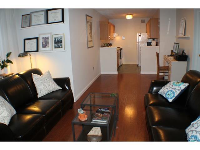 Living room facing kitchen - 44 Strawberry Hill Ave