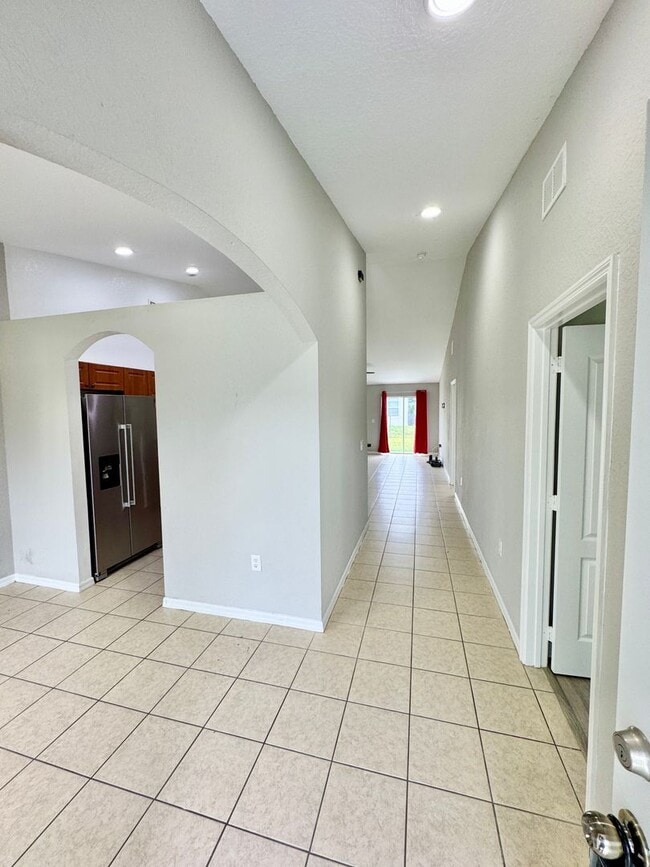 Building Photo - 4 Bedroom 2 Bath Home in Poinciana Village 3
