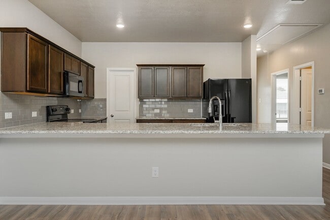 Building Photo - Where Style Meets Comfort: Elevate Your Living Experience