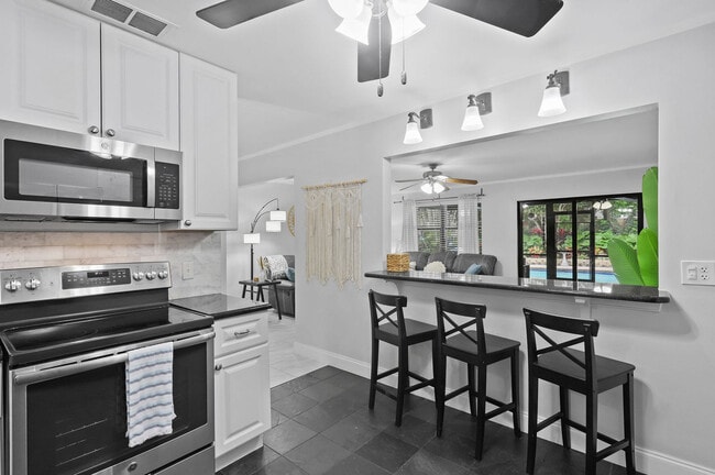 Building Photo - 4416 Fuschia Cir S