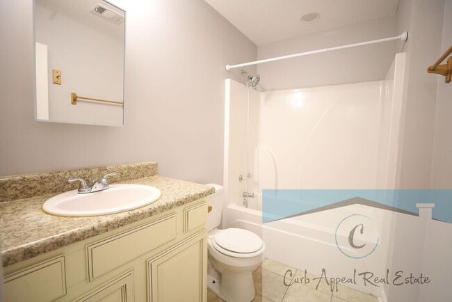 Building Photo - First month move in special $600!! Recently built 2 bed, 1 bath apartment - includes dishwasher a...