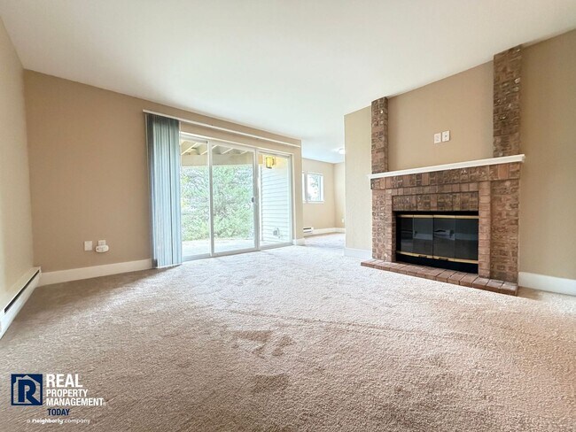Building Photo - Prime Tacoma Narrows Condo with Covered Parking & Patio