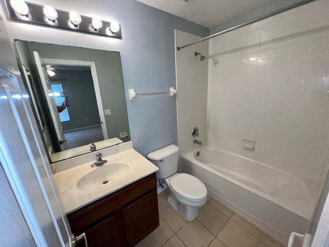 Building Photo - AVAILABLE NOW! Charming 2 Beds 2.5 Bath Townhome! 2 MASTER SUITES! Attached one car garage!! Extr...