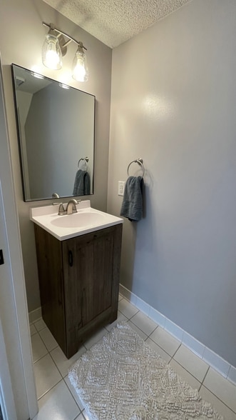 Main floor bathroom. - 15805 24th Ave N.