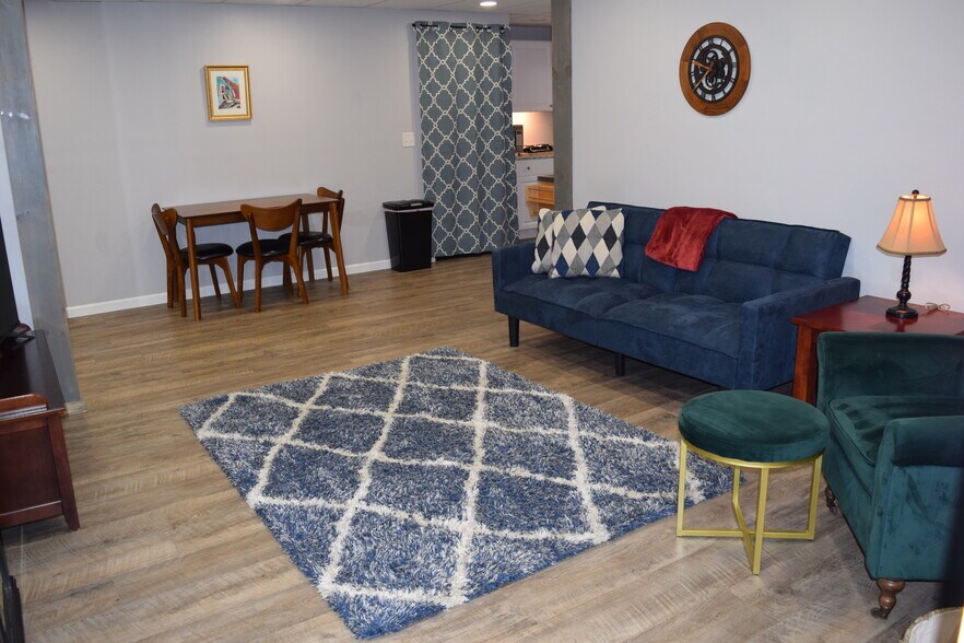 Living/Dining with fold down sofa & Roku TV - 826 Terrace St