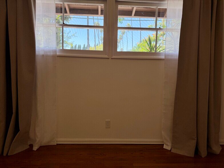 Front Bedroom with blackout curtains and sheers - 2101 Laverna Ave