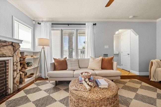 Building Photo - Welcome to this stunning 4-bedroom, 2-bath...