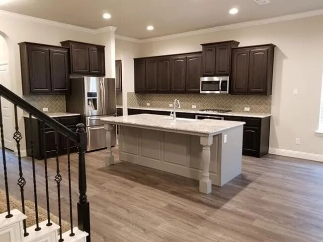 Building Photo - Coming Soon! 4BR/3.5BA | Updated Single Family Home | 2-Car Garage Parking | Fenced backyard