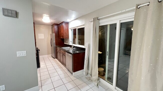 Kitchen has granite counters, raised panel cabinets, and new stainless appliances In - 3446 Thunder Dr