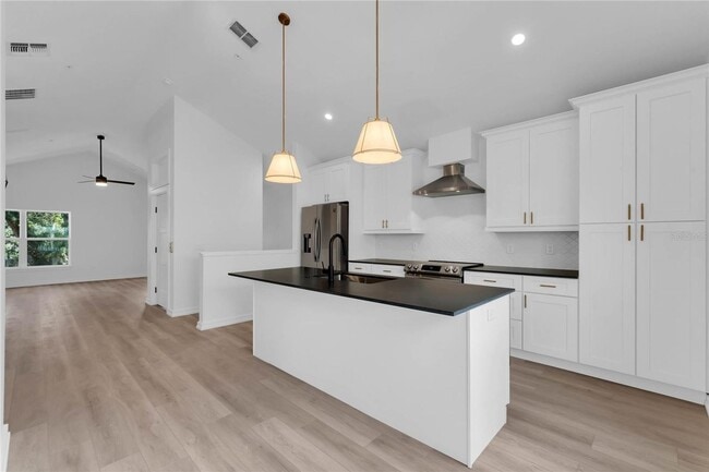 Building Photo - Available Now: 3-story townhome new constr...