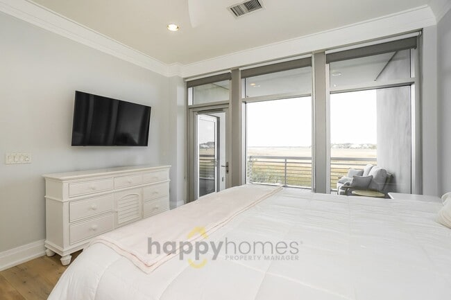 Building Photo - Waterfront Oasis: Fully Furnished 1BR/1.5BA with Marsh Views