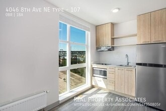 Building Photo - 4046 8th Ave NE