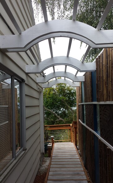 Walkway alongside house to Apartment in back. - 8261 Northrop Plz SW