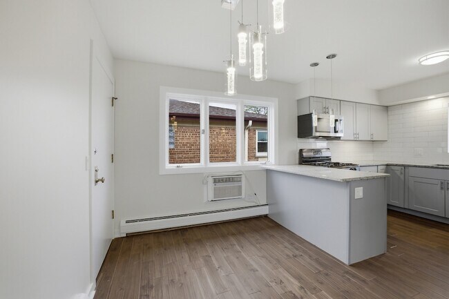 Building Photo - 6555 W Belmont Ave