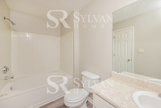 Building Photo - Turn the key. Enter. Smile. Repeat every day!