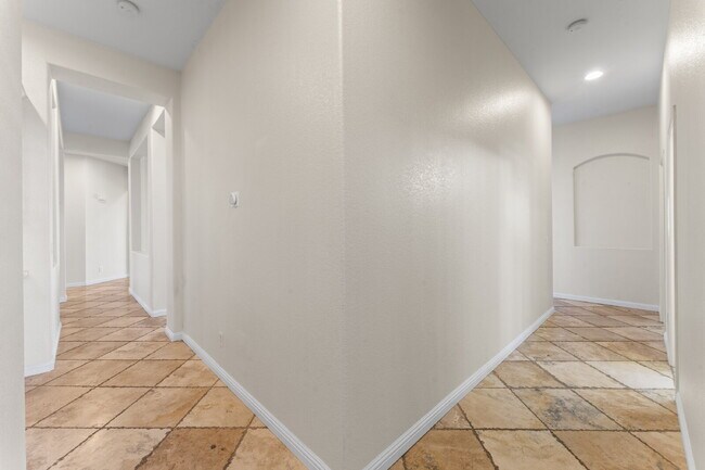 Building Photo - "Spacious Ranch Style 4-Bedroom Oasis with...