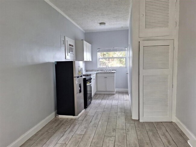 Building Photo - 9150 44th Ave