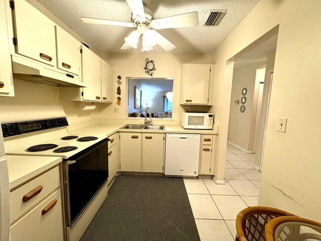 Building Photo - 9485 Boca Cove Cir