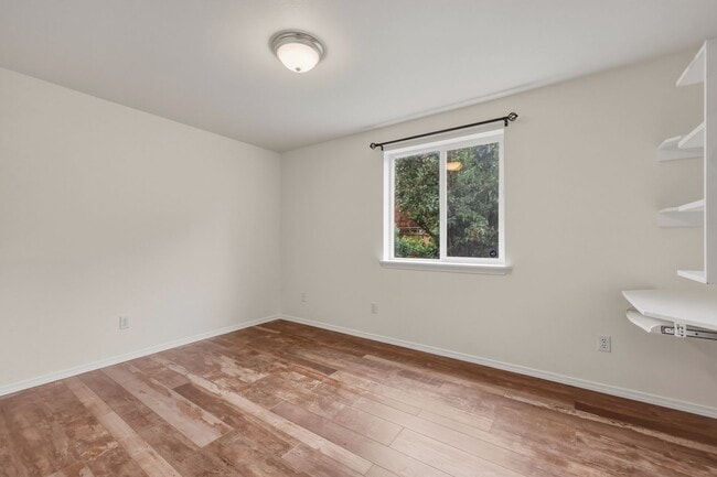 Building Photo - Beautifully Updated 3-Bedroom Rambler with Open Floor Plan & Private Fenced Yard