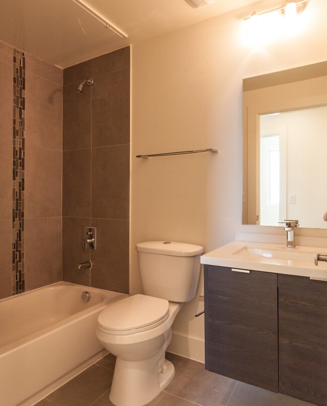 Building Photo - Stunning 2/2.5 multi-level Skybridge Lofts...
