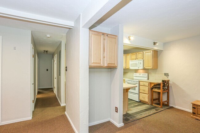 Building Photo - Walk to everything! Partially Furnished! Flexible lease terms!