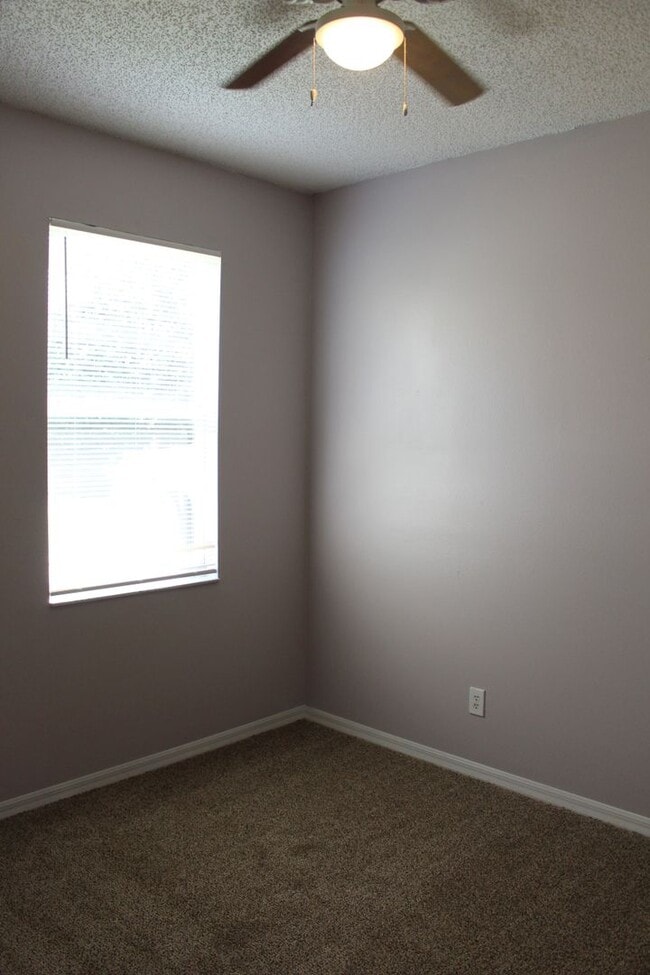 Building Photo - Freshly painted, four bedroom home available now!